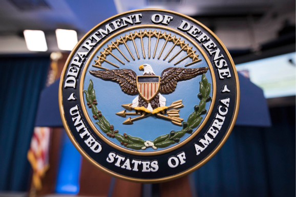Podium with the DoD Seal on it.